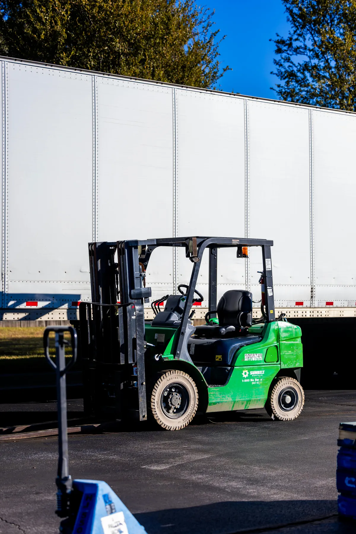 LPG propane forklift operating in warehouse with pneumatic tires